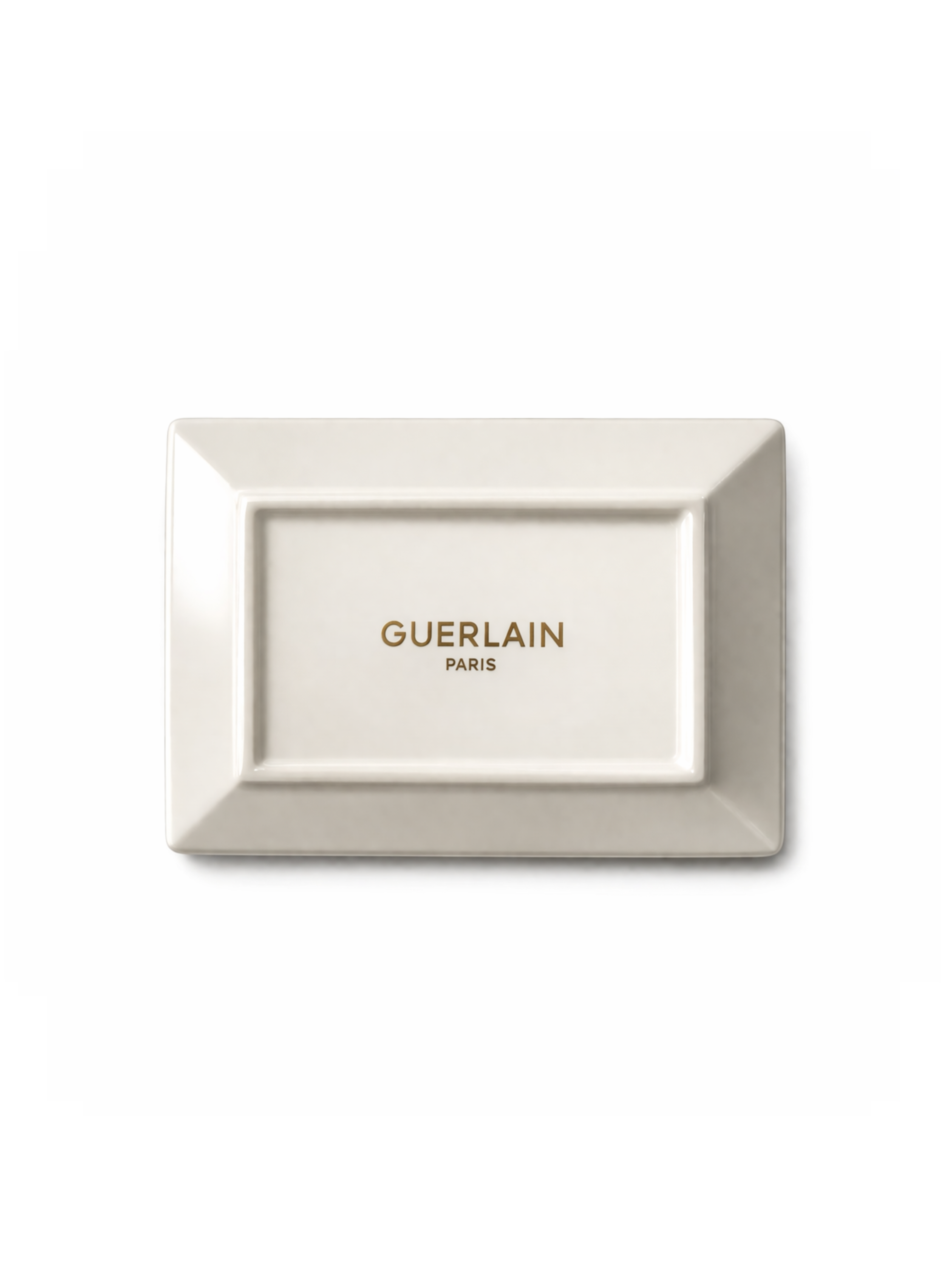 underside view of the Guerlain white porcelain tray, showing the clean rectangular base and the gold 'GUERLAIN PARIS' logo stamped in the center