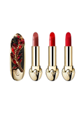 Guerlain Rouge G luxury lipstick with jeweled case, displayed alongside three classic red and nude shades on a white background