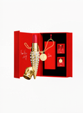 CHRISTIAN LOUBOUTIN Rouge Louboutin Strass Limited Edition gift set featuring the L’Écrin Strass refillable lipstick case, 003G Mundo Red lipstick refill, two decorative charms, and luxury collector’s gift box.