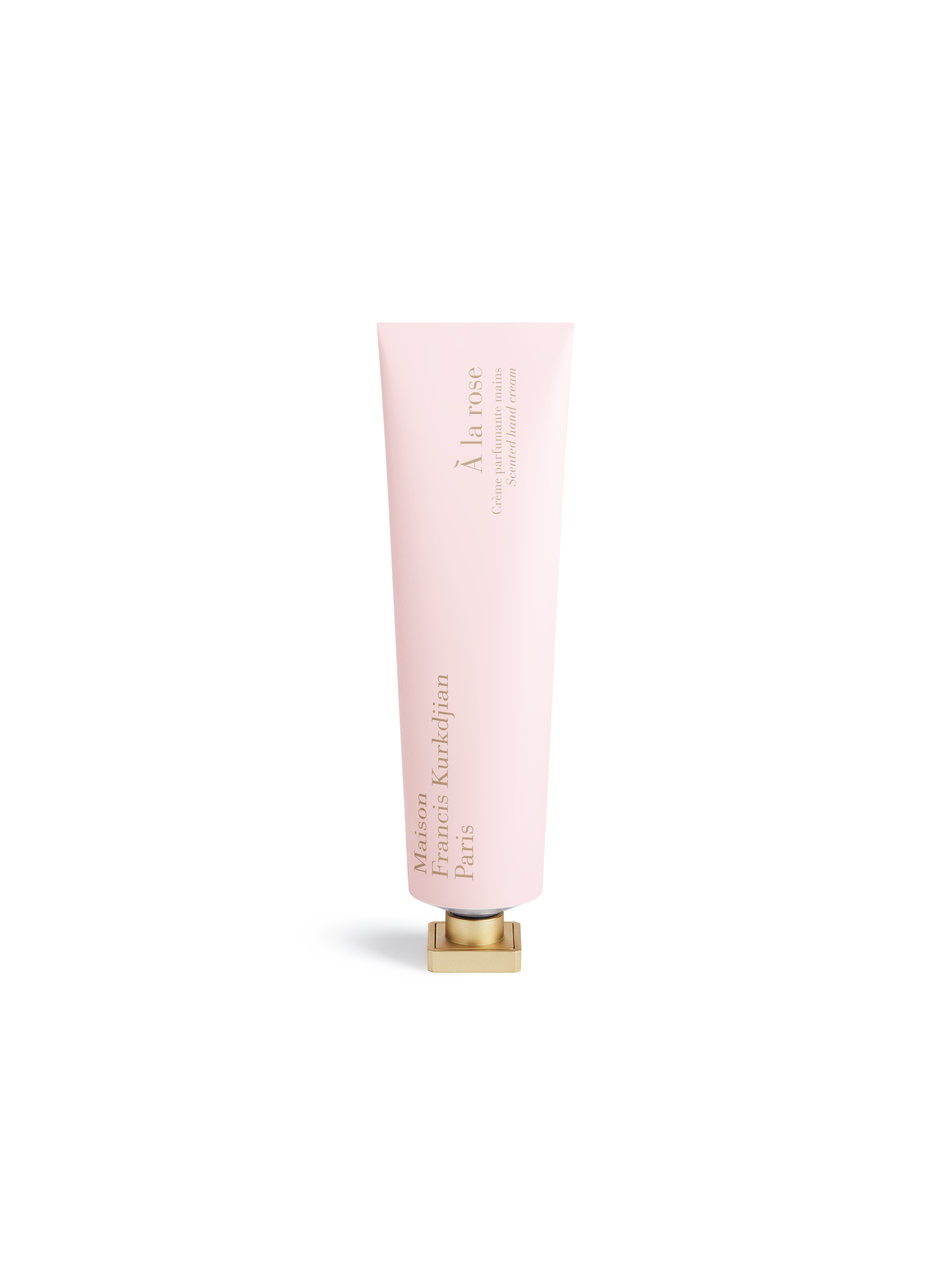 Maison Francis Kurkdjian À la rose scented hand cream in pink tube with gold cap, front view on white background