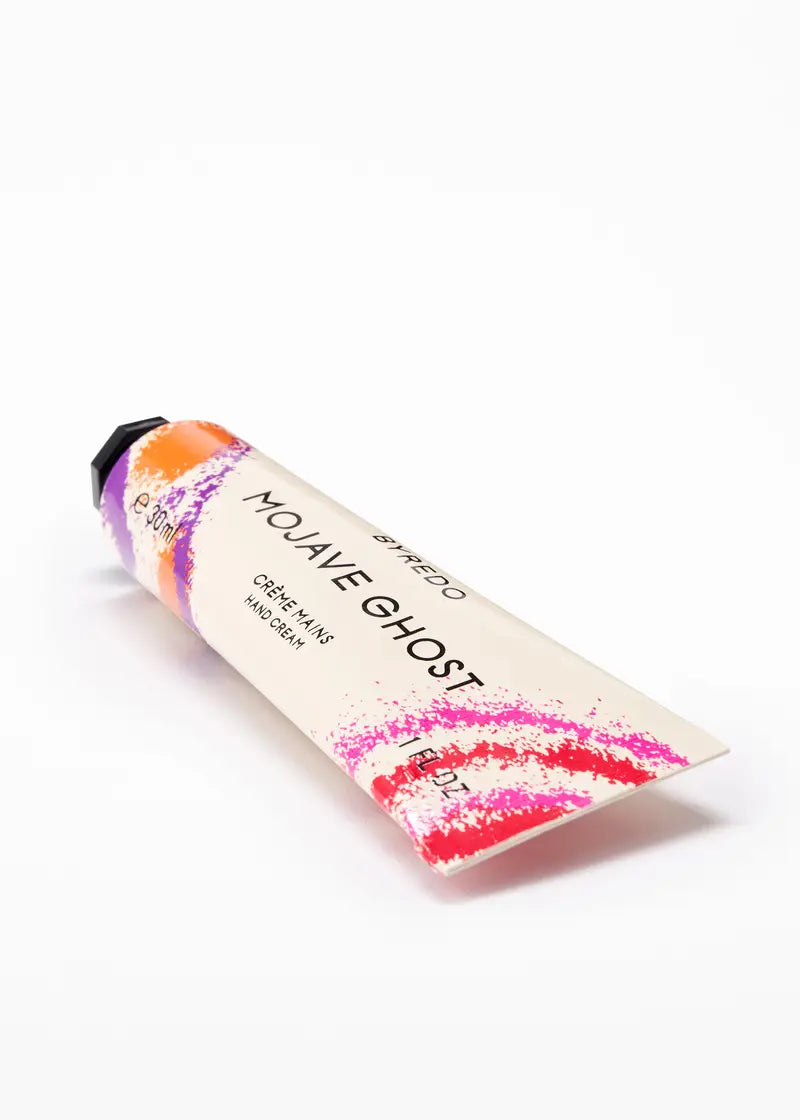 Hand cream tube labeled 'Mojave Ghost' with colorful design on a white background