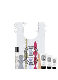 Diptyque travel gift set with white art tote bag, Eau des Sens perfume mini and skincare essentials