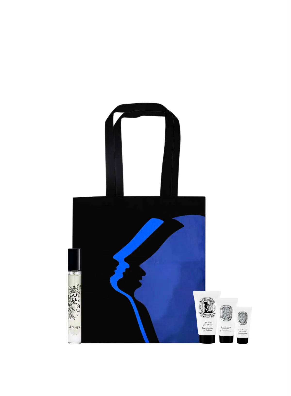 Diptyque luxury travel gift set with blue art tote bag, Eau des Sens perfume, and body care minis