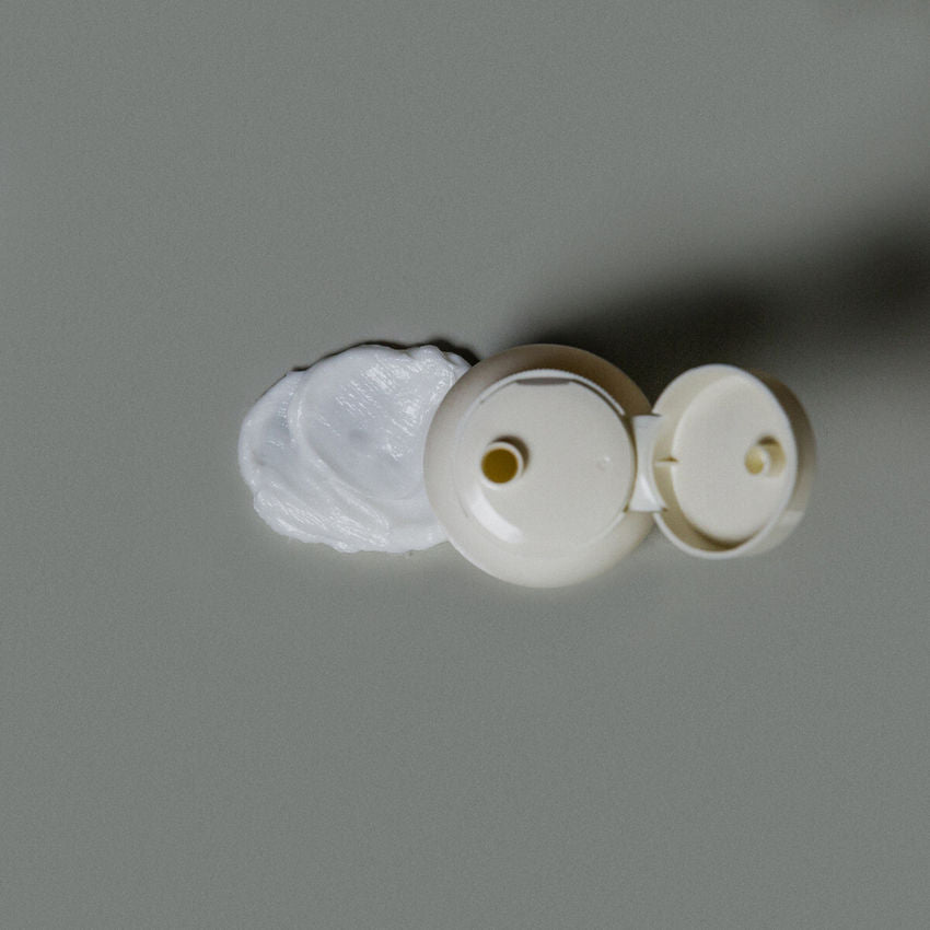 le labo white plastic components on a gray background