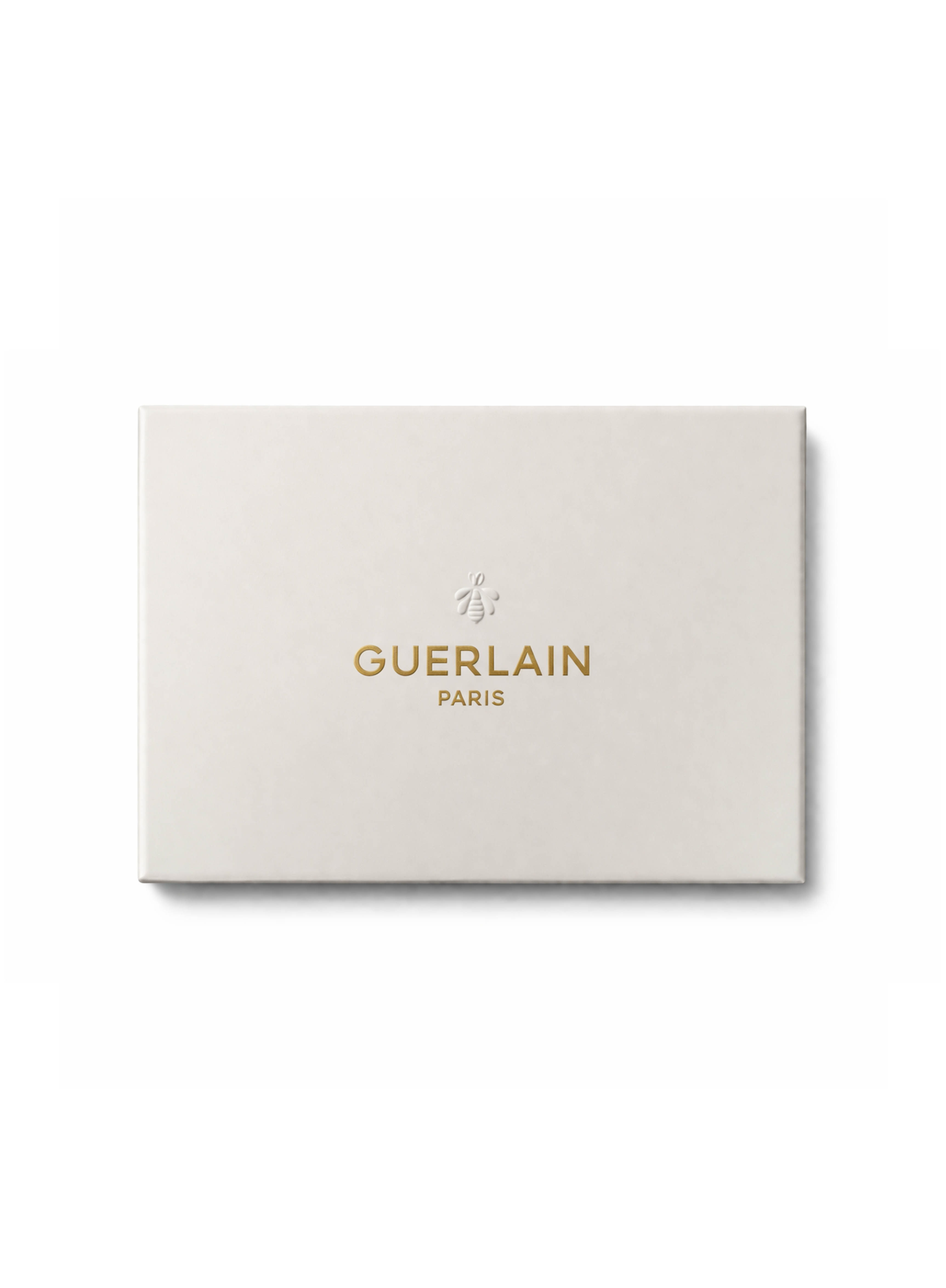 Elegant white textured gift box for the Guerlain Luxury Porcelain Tray, featuring the gold Guerlain Paris logo and signature bee motif centered on the lid
