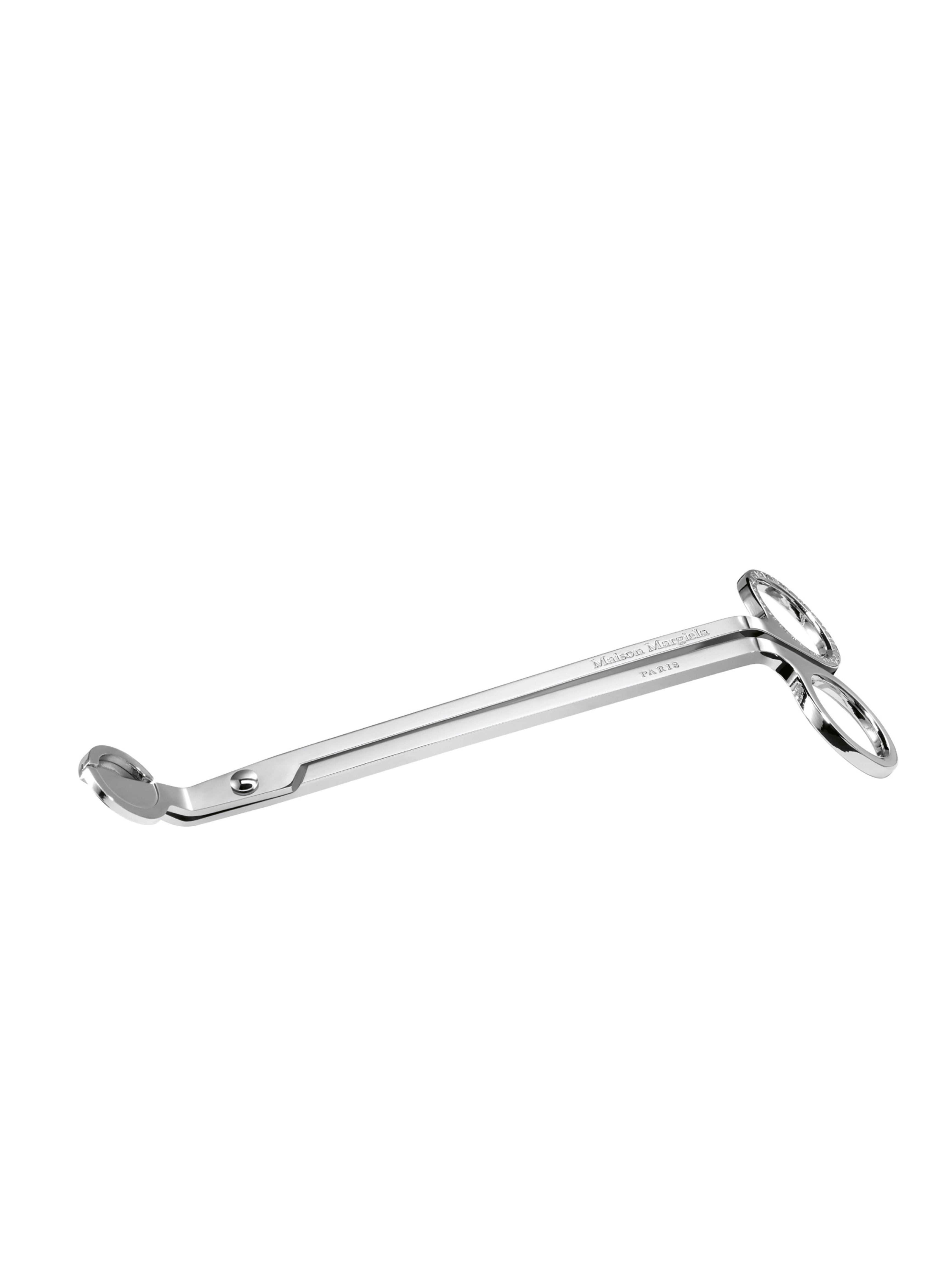 Maison Margiela candle wick cutter in polished silver on a white background
