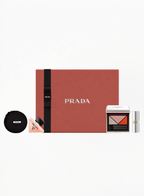 Authentic PRADA Monochrome Lipstick Mini R28 PULP paired with PRADA Dimensions Eyeshadow 06 and Paradoxe Eau de Parfum 7ML in a luxury collectible beauty set, available at Exquisite.