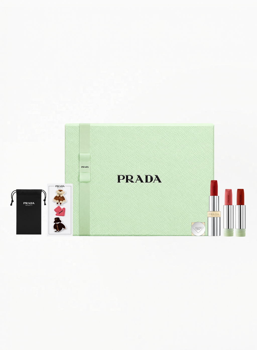 Authentic PRADA curated lipstick set featuring full-size Prada Lipstick R28 Fuoco, Monochrome Soft Matte Lipstick Refills O177 and B103, paired with a signature PRADA lipstick case designed for elegant storage and protection, available at Exquisite.
