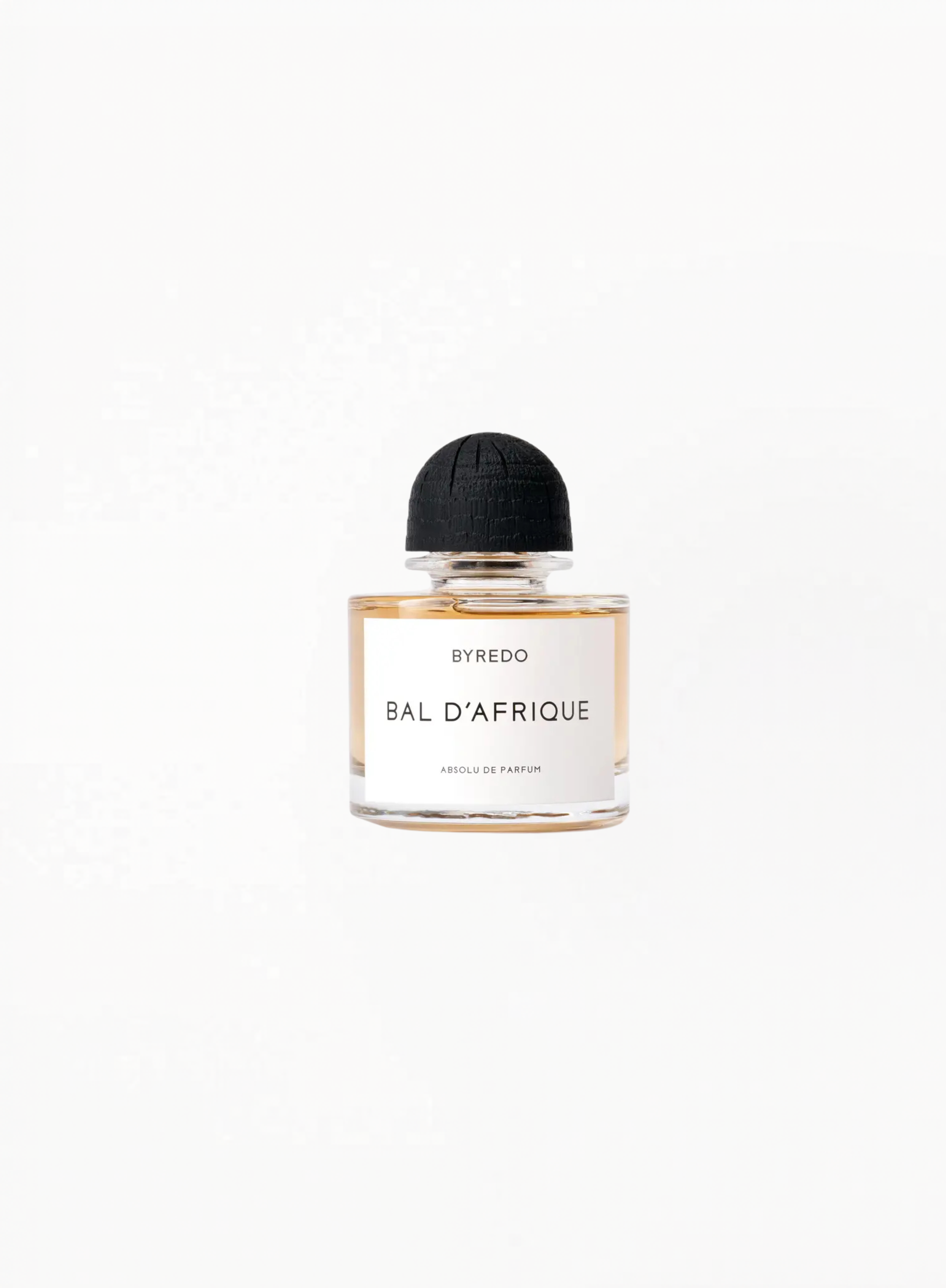 BYREDO Bal d’Afrique Absolu de Parfum 100ML bottle with gold cap and clear glass design on white background — authentic luxury fragrance available at Exquisite Georgia.