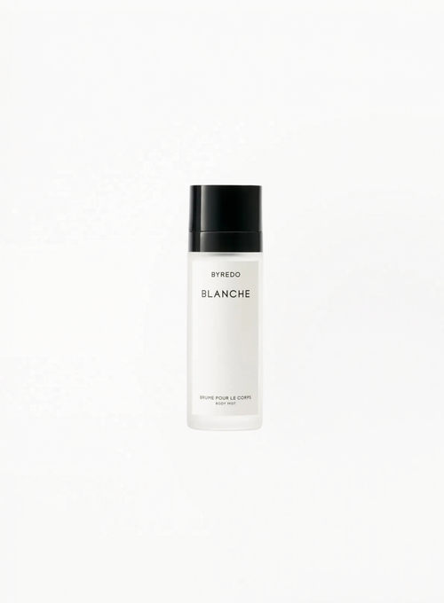 BYREDO Blanche Body Mist in a minimalist frosted bottle with black cap on a clean white background — luxury body care product available at Exquisite.