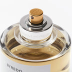 Byredo Gypsy Water Absolu de Parfum bottle with gold spray cap on a white background