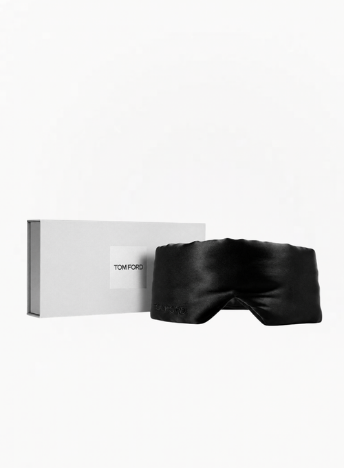 Black TOM FORD luxury sleep eye mask with original TOM FORD presentation box on a white background, available at Exquisite.