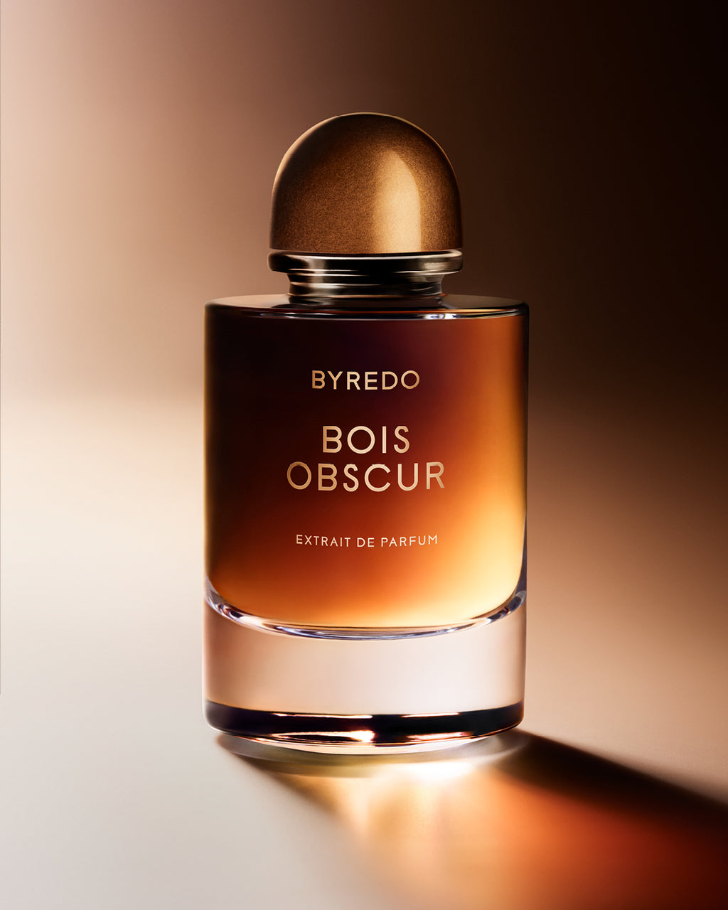 Byredo Bois Obscur perfume bottle on a gradient background