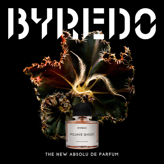 Byredo Mojave Ghost perfume bottle with plant design on a black background