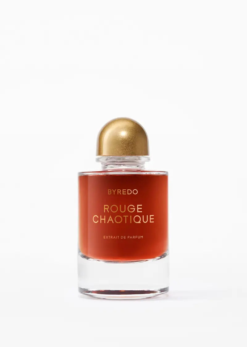 Byredo Rouge Chaotique perfume bottle with gold cap on a white background