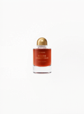 Byredo Rouge Chaotique Extrait de Parfum 70ML by BYREDO, deep red bottle with antique gold cap on white background, luxury fragrance available at Exquisite.