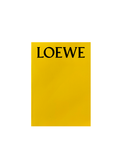 Loewe Limited Edition Yellow Notebook 21×15cm — minimalist yellow cover with black Loewe logo on a white background.