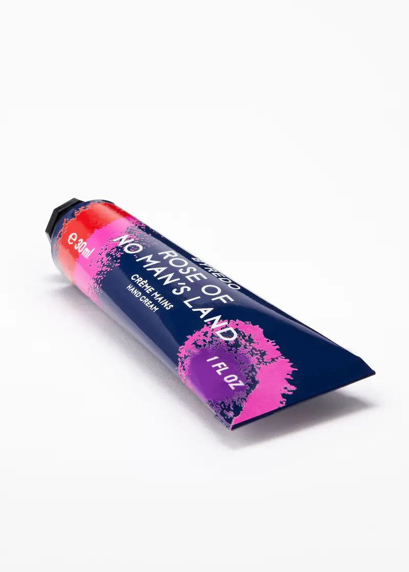 Colorful tube of paint with byredo 'Rose of No Man's Land' branding on a white background, original byredo at exquisite, tbilisi, georgia