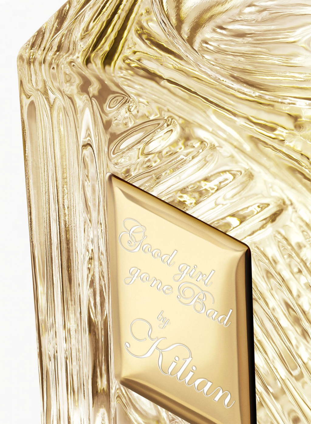 Close-up of the KILIAN Good Girl Gone Bad Eau de Parfum bottle showcasing the signature gold plaque and sculpted glass details