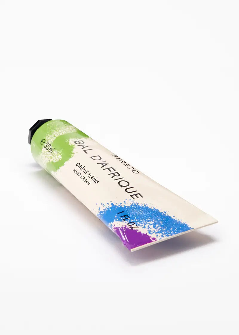 Tube of byredo Bal d'Afrique hand cream on a white background