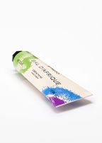 Tube of byredo Bal d'Afrique hand cream on a white background