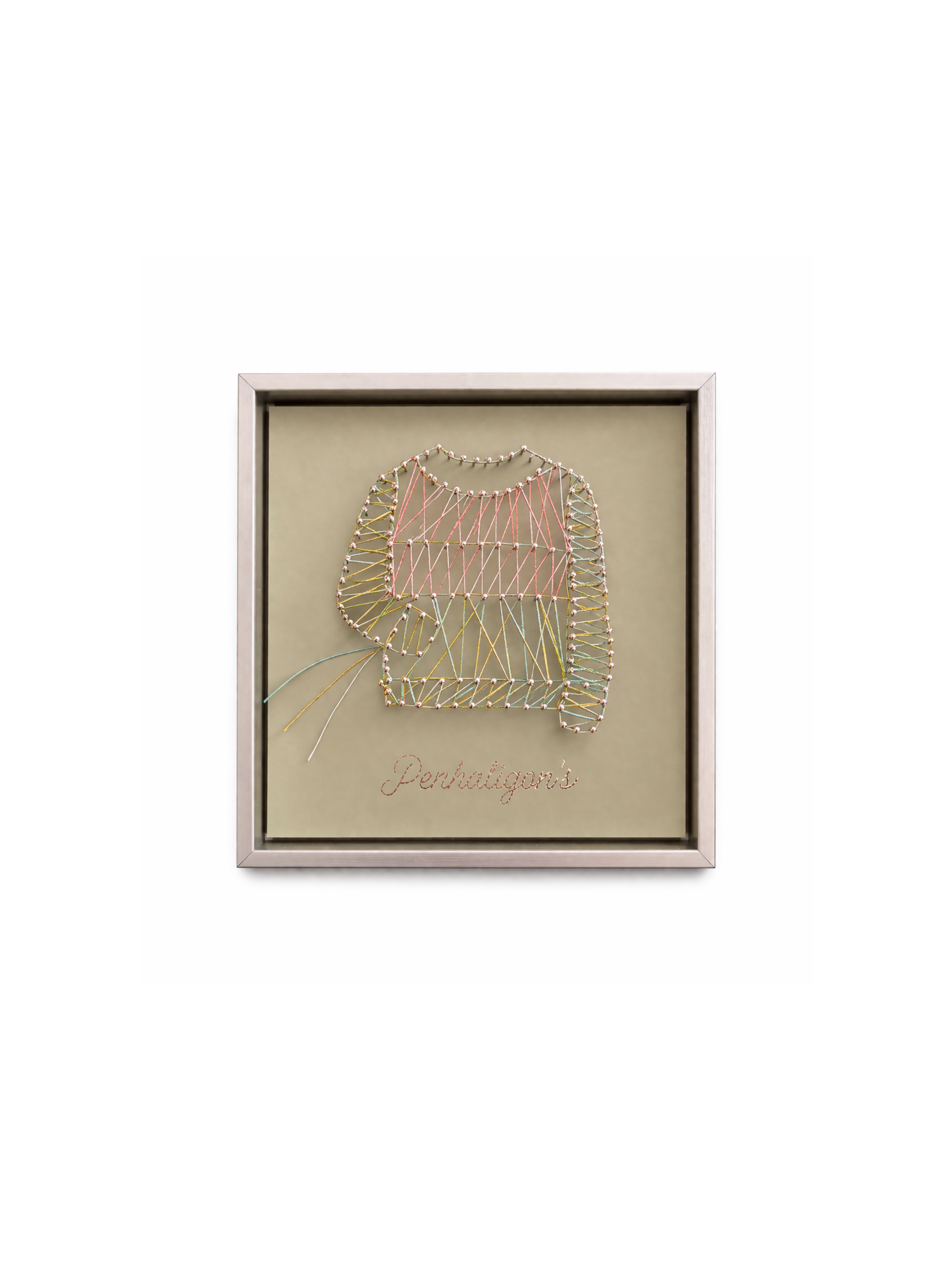 penhaligon's Framed embroidered artwork with a floral design on a beige background