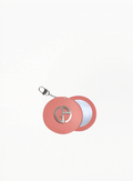 Giorgio Armani pink compact mirror keychain with silver logo and portable round mirror on white background, available at Exquisite.