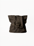 LE LABO waxed canvas tote bag with signature minimal branding and durable fabric design, available at Exquisite.