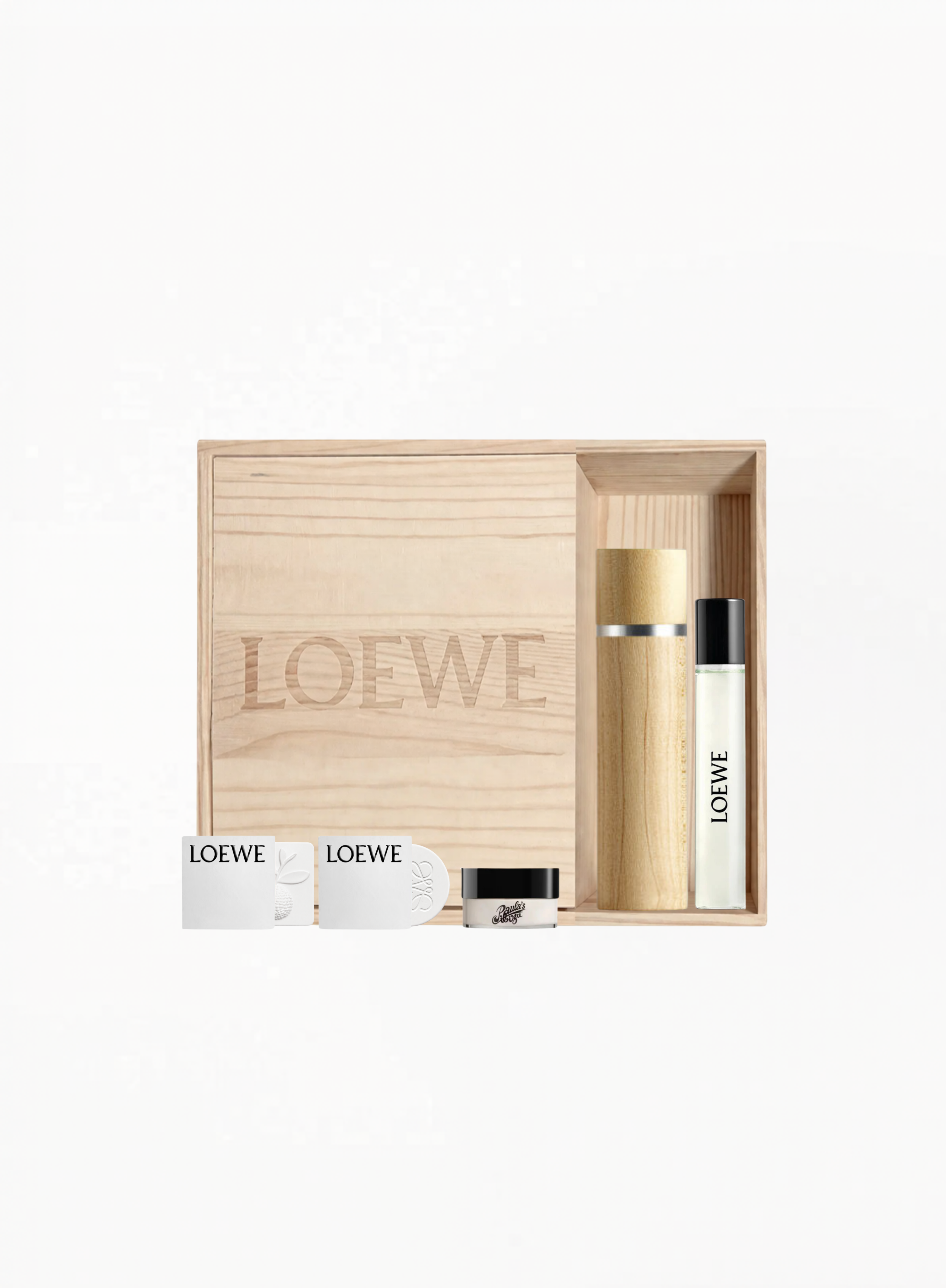 LOEWE Exclusive Wooden Gift Box with LOEWE 001 Eau de Parfum 15ml, two LOEWE 001 Woman Eau de Parfum 1.5ml samples, engraved wooden perfume case, and two ceramic scented soaps, available at Exquisite.
