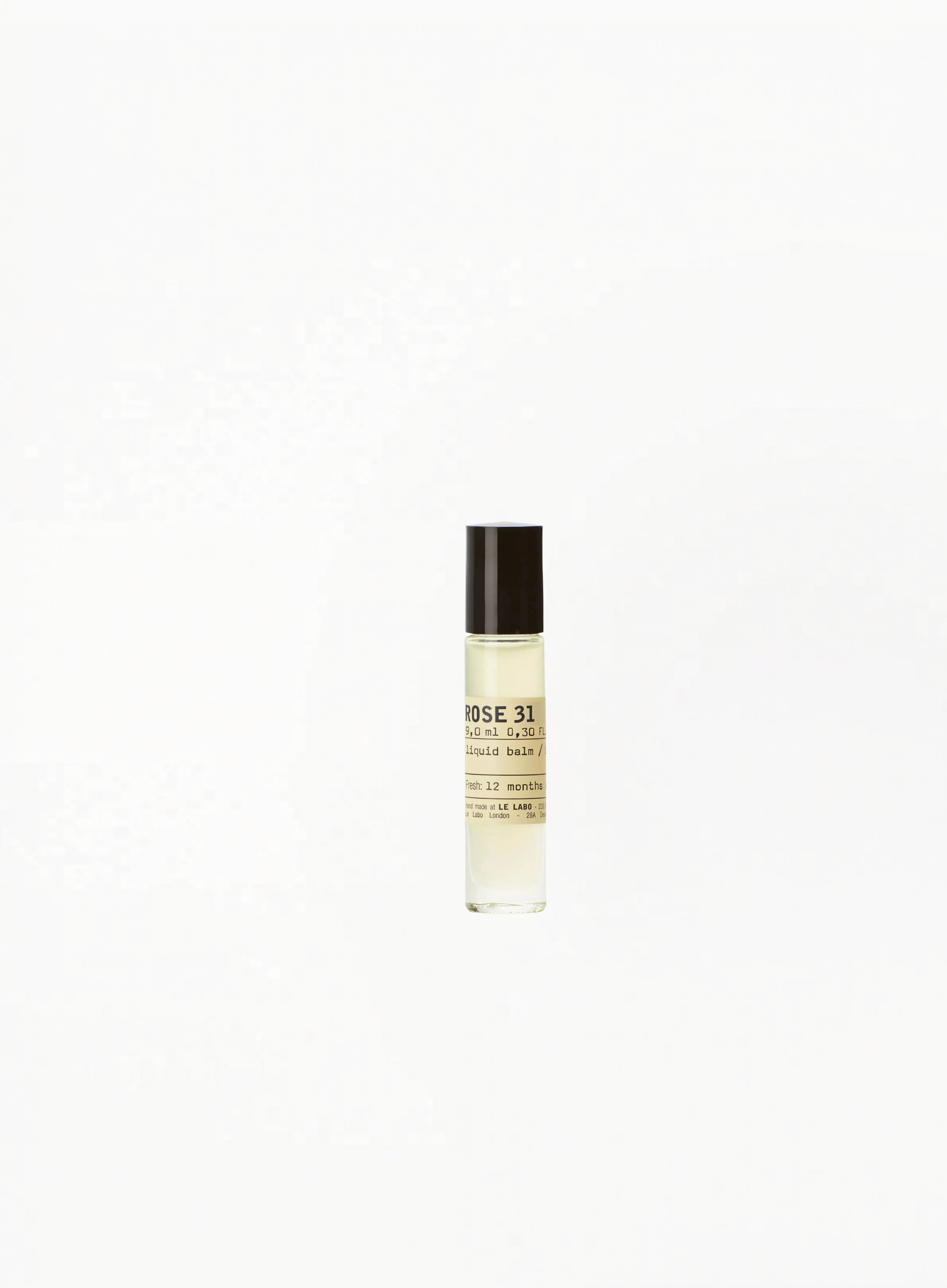 Le Labo Rose 31 Liquid Balm 9ml roll-on fragrance on a clean white background, authentic luxury niche perfume balm available at Exquisite.