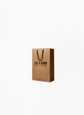 Le Labo medium gift bag with signature minimal design, available at Exquisite.