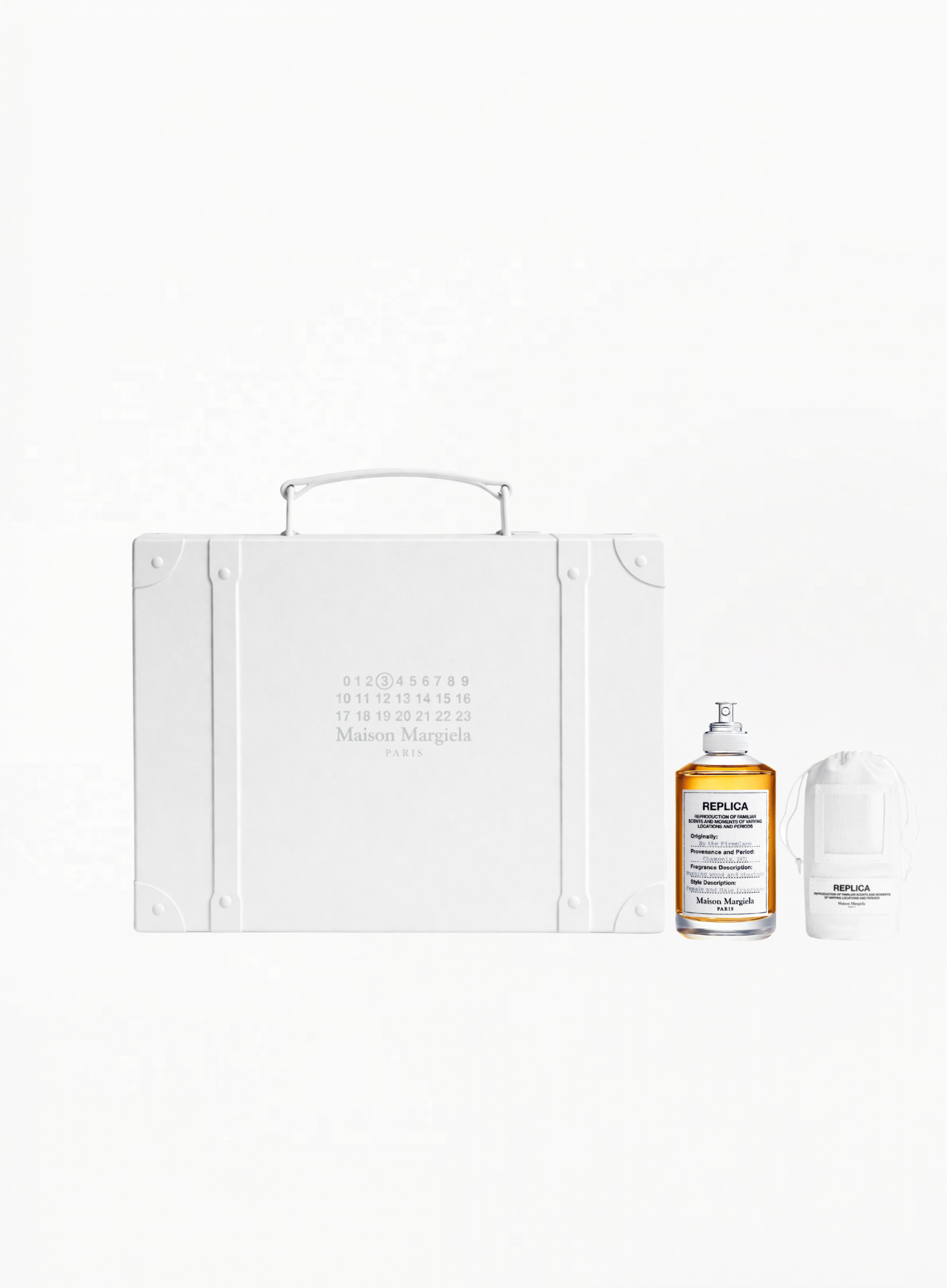 Maison Margiela By the Fireplace Ultra Limited Edition Set with signature Replica fragrance and limited-edition gift packaging, available at Exquisite.