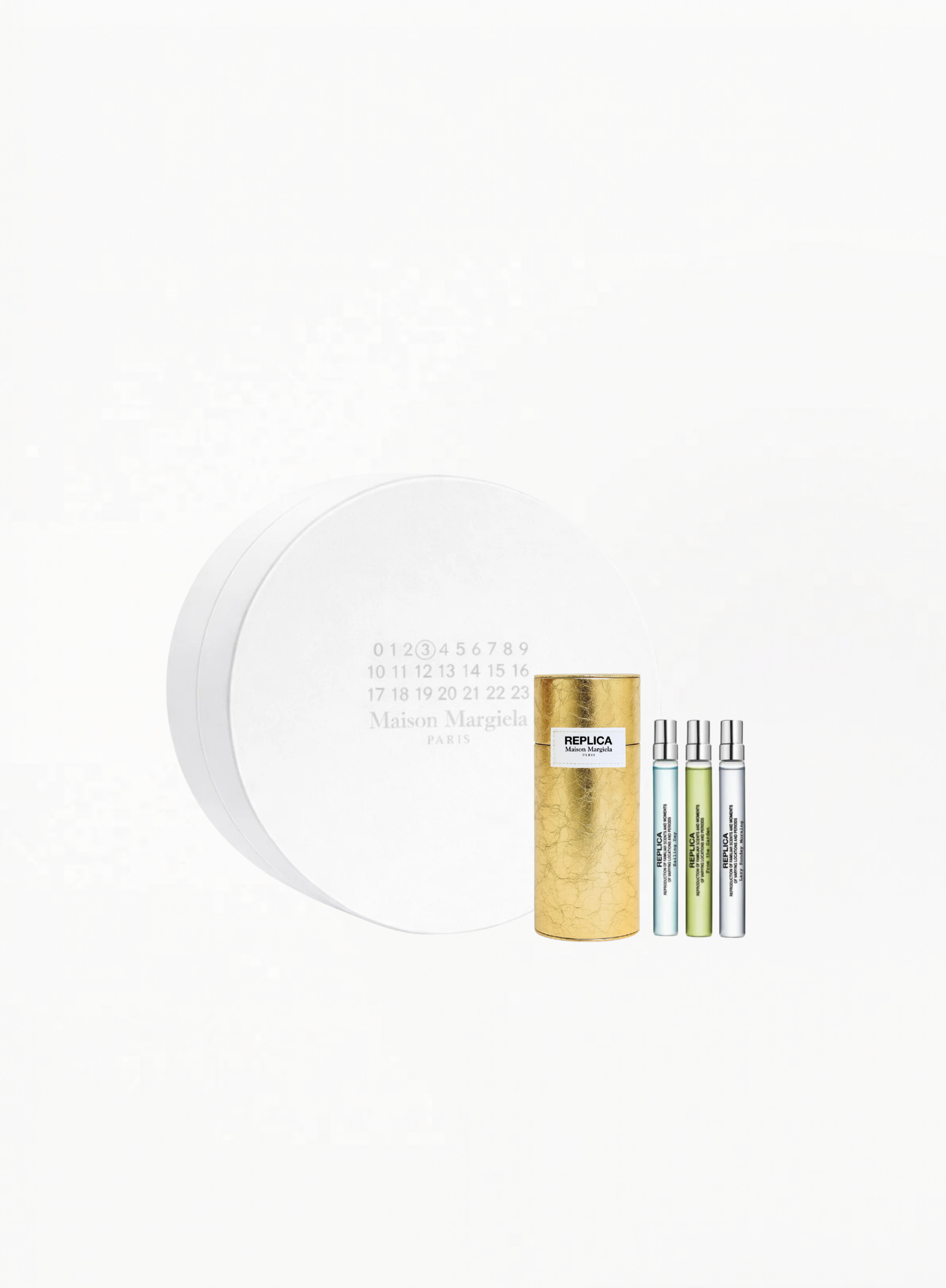 Maison Margiela Replica Mini Fragrance Set featuring Sailing Day, Lazy Sunday Morning, and From the Garden Eau de Toilette 10ml sprays, available at Exquisite.