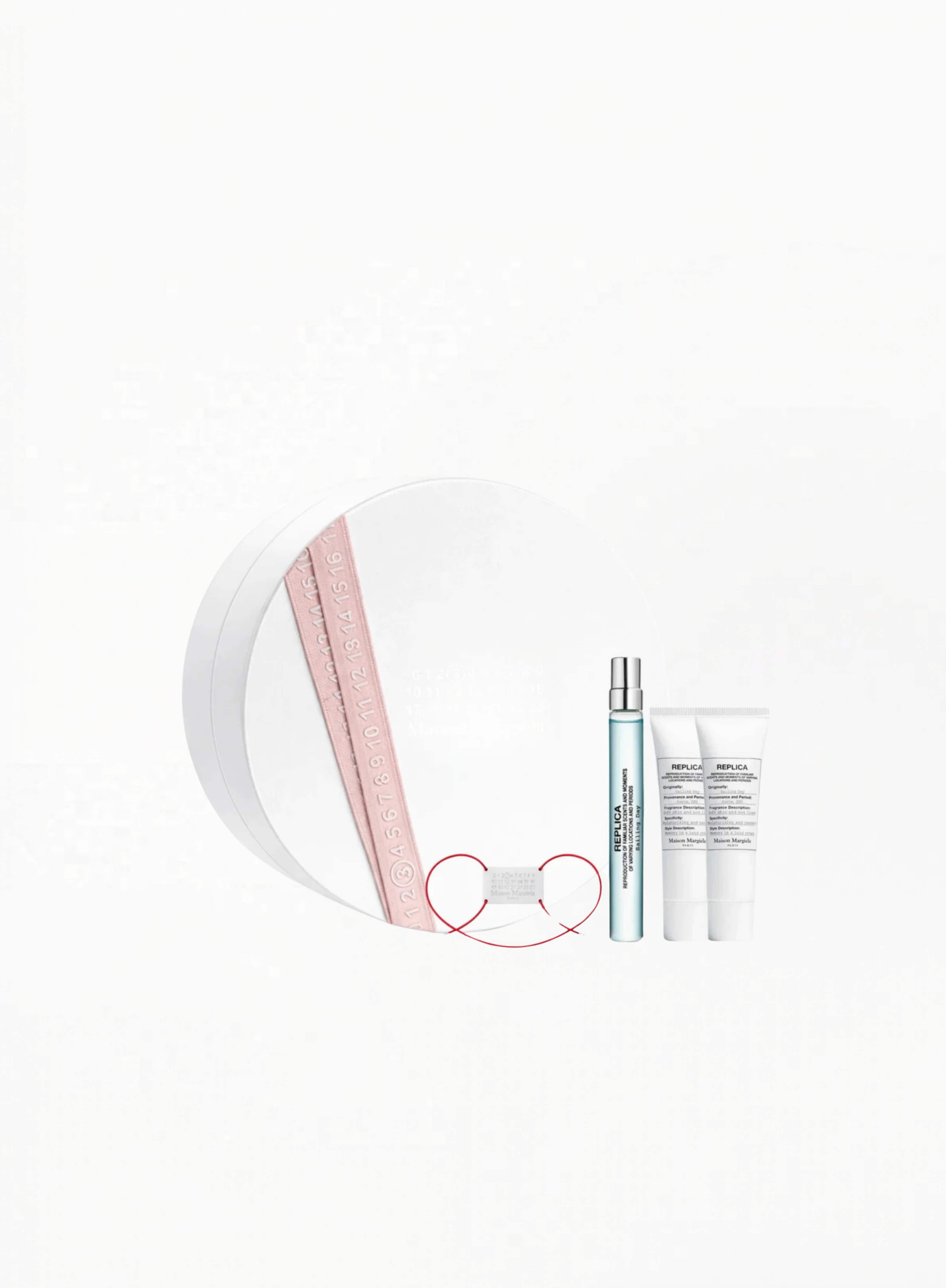 Maison Margiela Sailing Day Gift Set featuring 10ml Eau de Toilette, two 15ml body lotions, perfumable ceramic, and signature gift box, available at Exquisite.