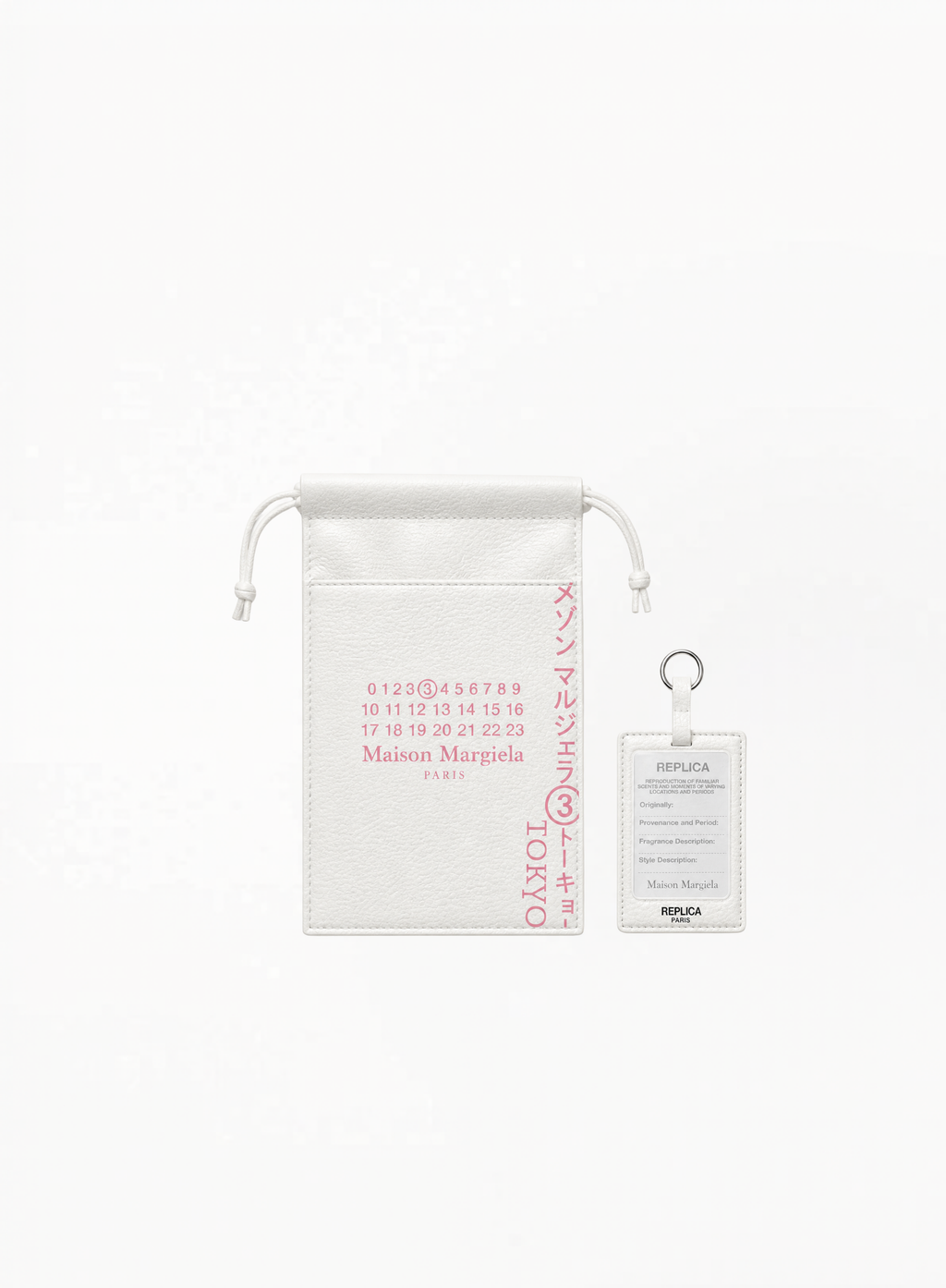 Maison Margiela Springtime in a Park Exclusive Tokyo Collection pouch with matching Replica keychain tag, authentic Maison Margiela accessory set available at Exquisite.