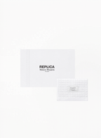 Maison Margiela Towel S 75×35cm with white textured design and Replica Maison Margiela box, authentic luxury towel available at Exquisite.