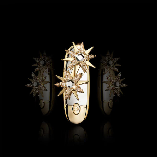 GUERLAIN ROUGE G TALE OF STARS with 2 reflections on both sides on a black background