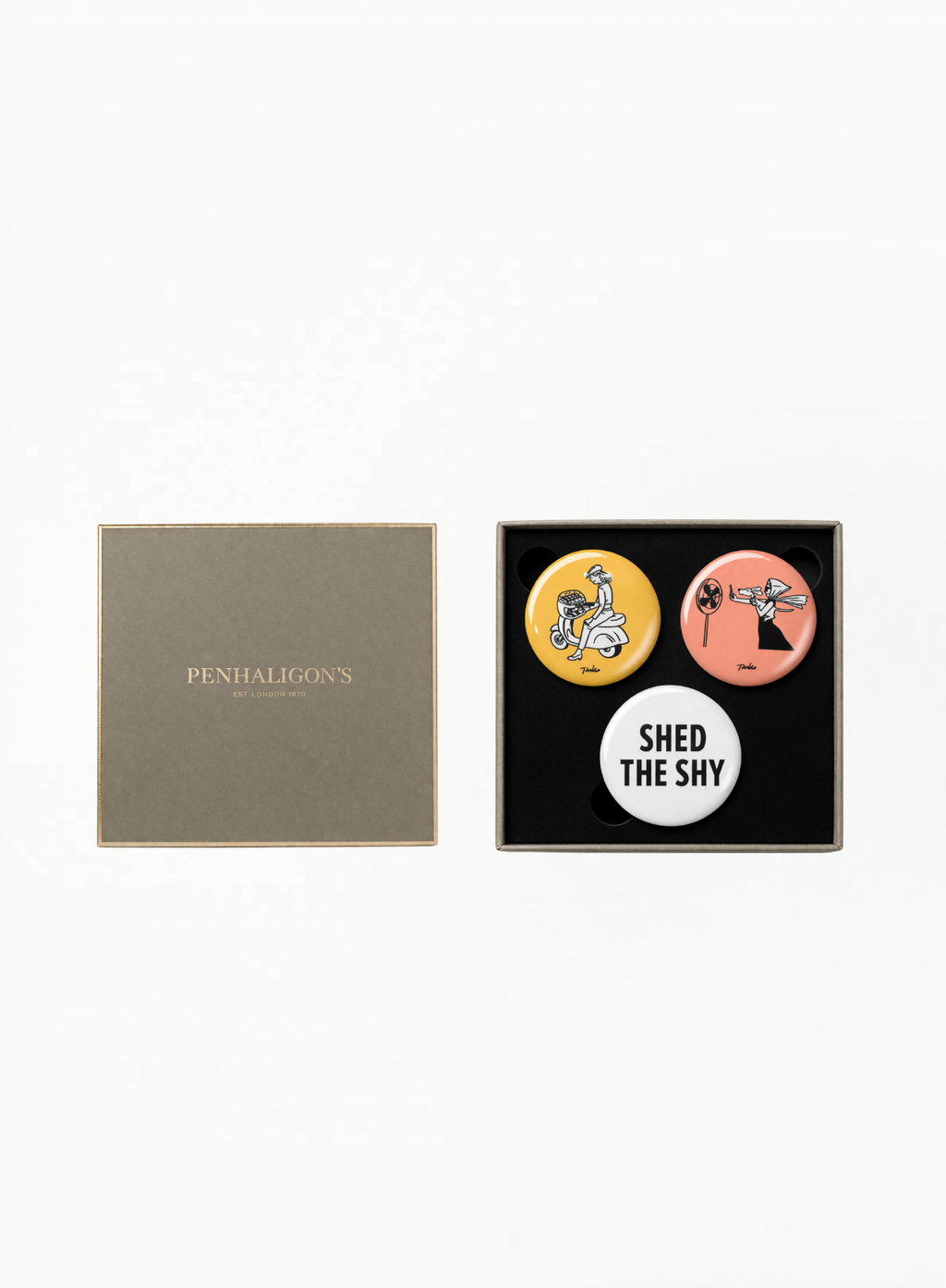 Penhaligon’s Collectible Badge Trio Gift Set featuring three collectible branded badges in a luxury presentation, designed as a playful limited edition accessory set by Exquisite.