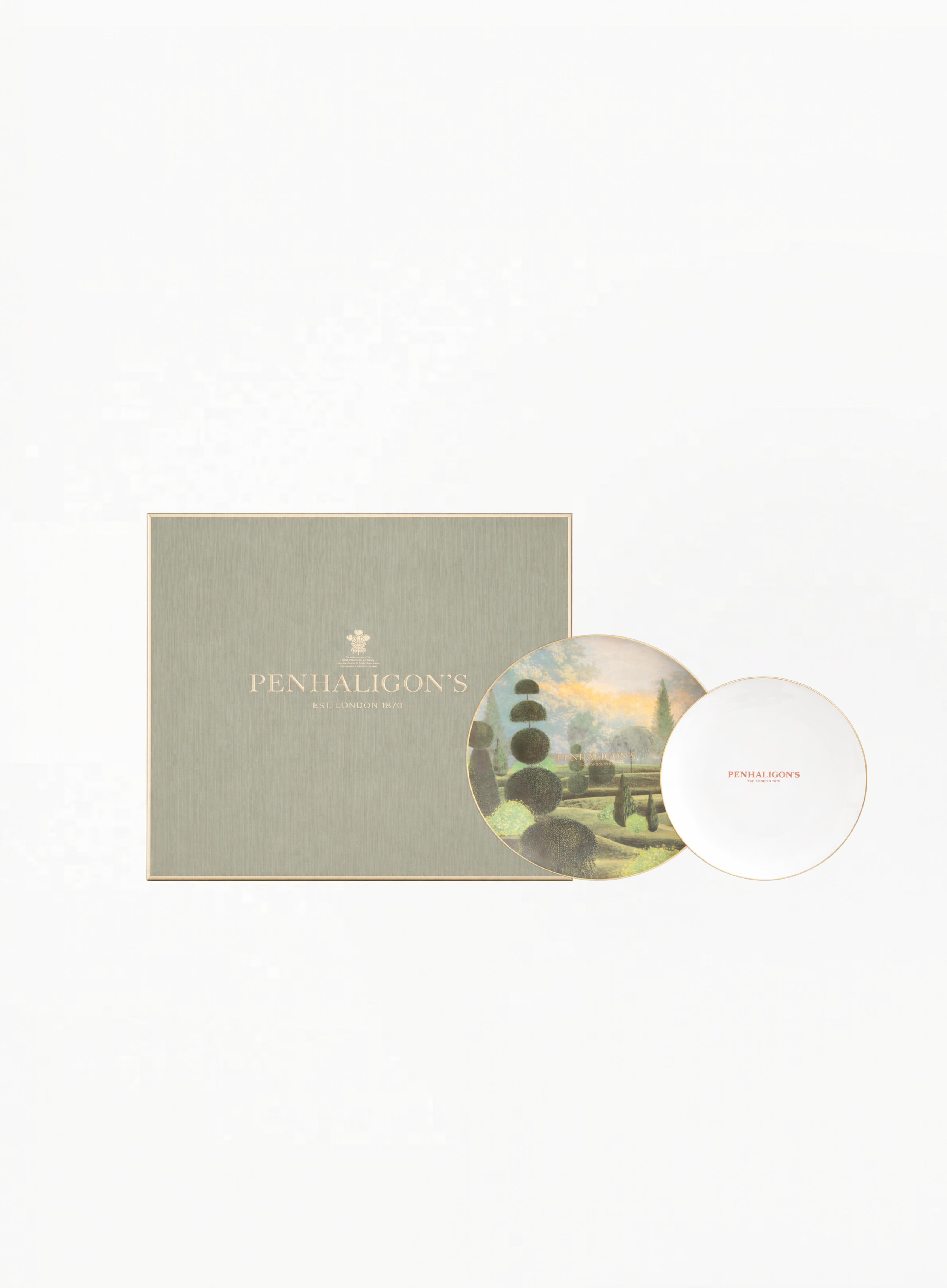 Penhaligon’s decorative tray with elegant garden artwork and gold detailing in luxury presentation packaging for Exquisite.
