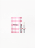 Prada Light Glowing Lip Oil Stick U014 White displayed on a clean background, featuring Prada Beauty’s sleek luxury packaging and luminous lip oil formula in an authentic refined design.
