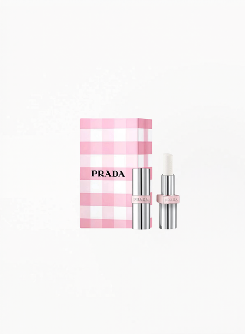Prada Light Glowing Lip Oil Stick U014 White displayed on a clean background, featuring Prada Beauty’s sleek luxury packaging and luminous lip oil formula in an authentic refined design.