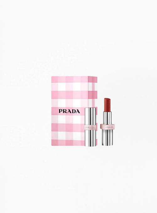 Prada Light Glowing Lipcolor U020 Rosso with Prada gift box, presented in elegant authentic luxury packaging on a clean background, featuring Prada Beauty’s refined red shade and premium design.