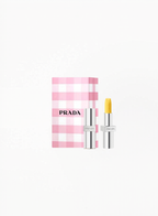 Prada Lip Balm U002 Astral Pink with Limited Edition Prada box, displayed on a clean elegant background featuring authentic Prada Beauty luxury packaging and refined soft pink details.