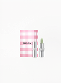 Prada Optimizing Care Lip Balm U000 Universal in a Limited Edition Prada box, presented on a clean elegant background featuring authentic Prada Beauty packaging and refined minimalist luxury details.