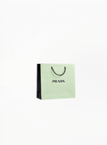 Prada Paper Bag gift packaging with elegant branded design, photographed on a clean white background for Exquisite.