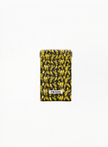 Prada banana-shaped lipstick pouch with playful curved silhouette and smooth finish on white background.