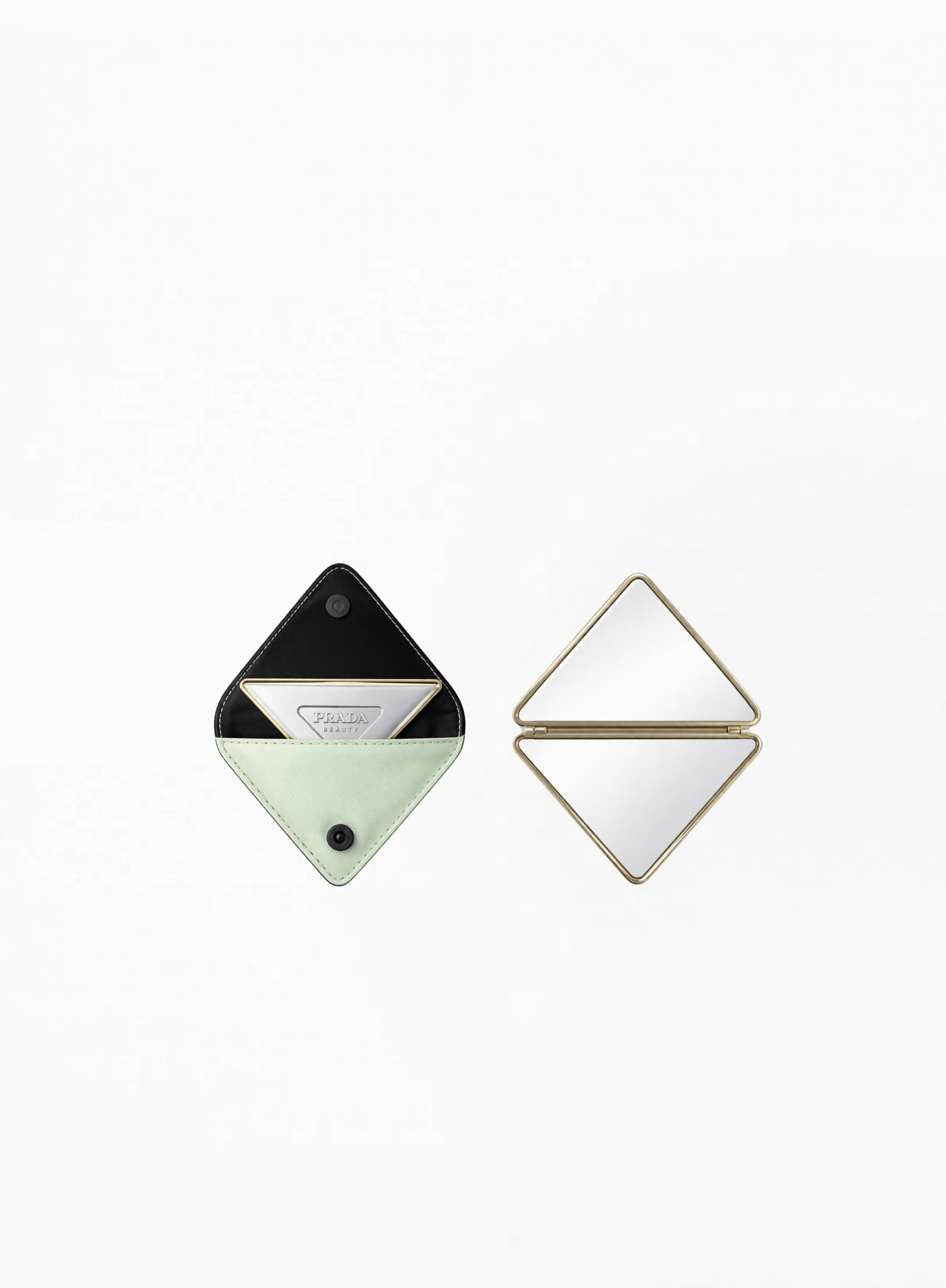 Prada two-sided mirror with mini pouch in compact luxury design on white background.