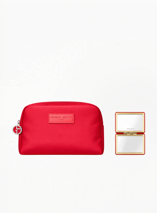 Red Armani cosmetic bag with matching compact mirror on a white background, luxury limited edition accessory available at Exquisite.