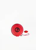 Red Giorgio Armani round cosmetic pouch with black embossed logo and matching mini accessory on a white background.
