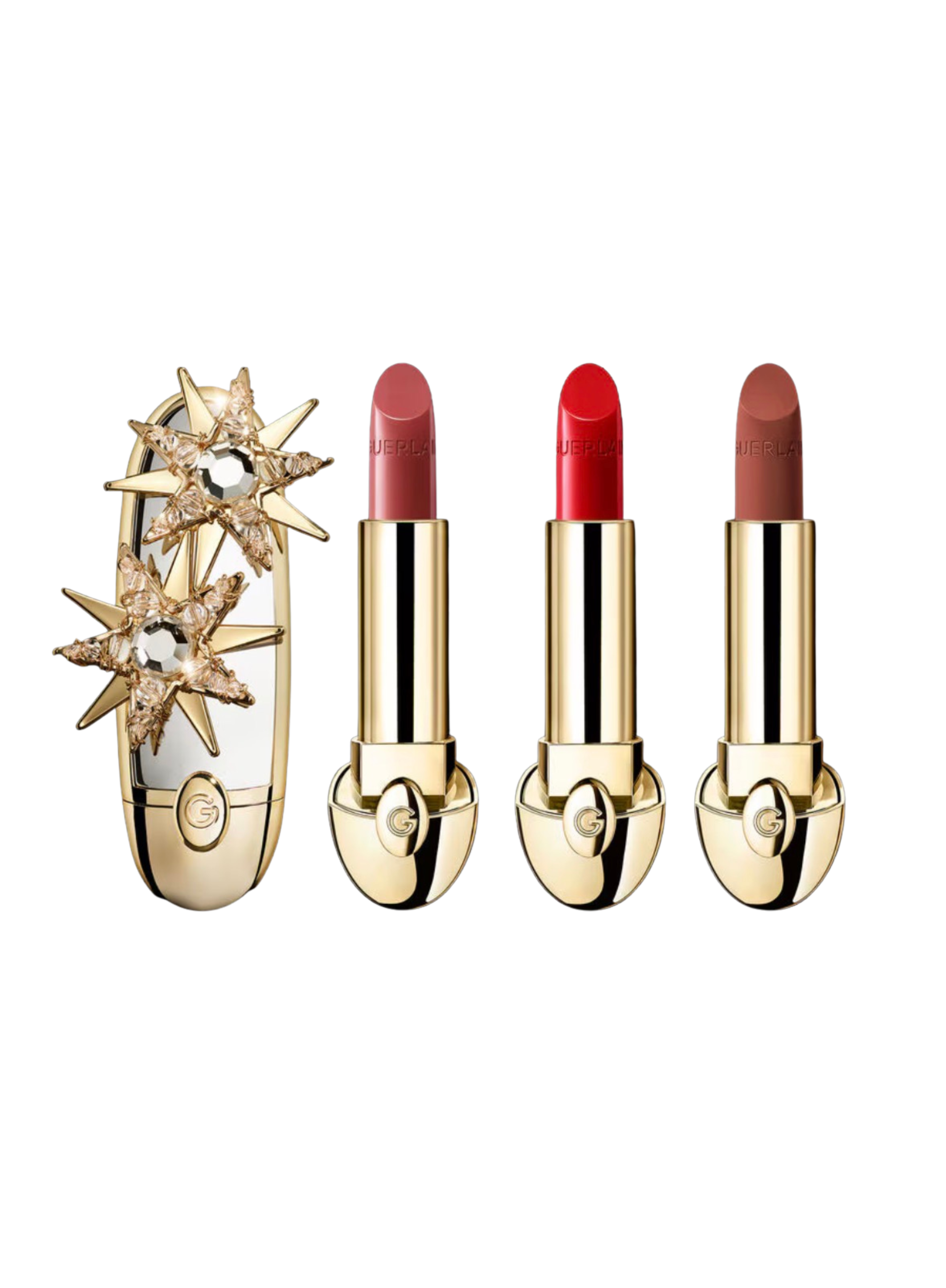 Guerlain Rouge G Tale of Stars jeweled lipstick case displayed with three Rouge G lipsticks in nude and red shades.